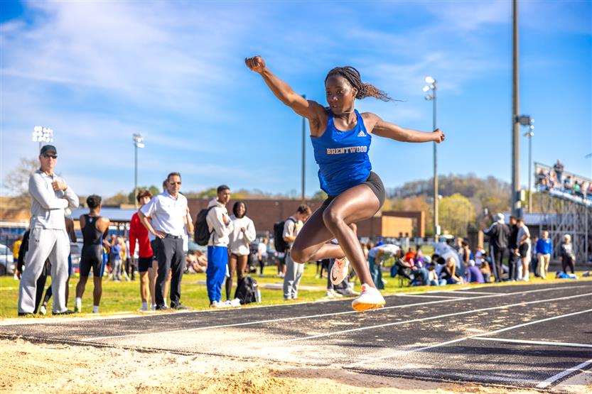 Students run in track and field
